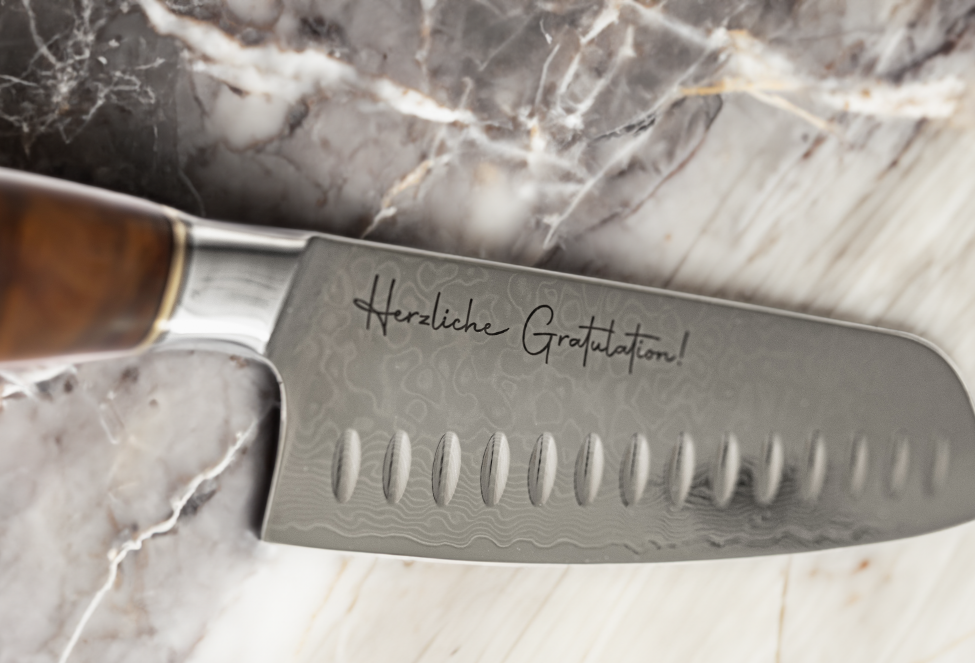 Damastmesser mit Gravur